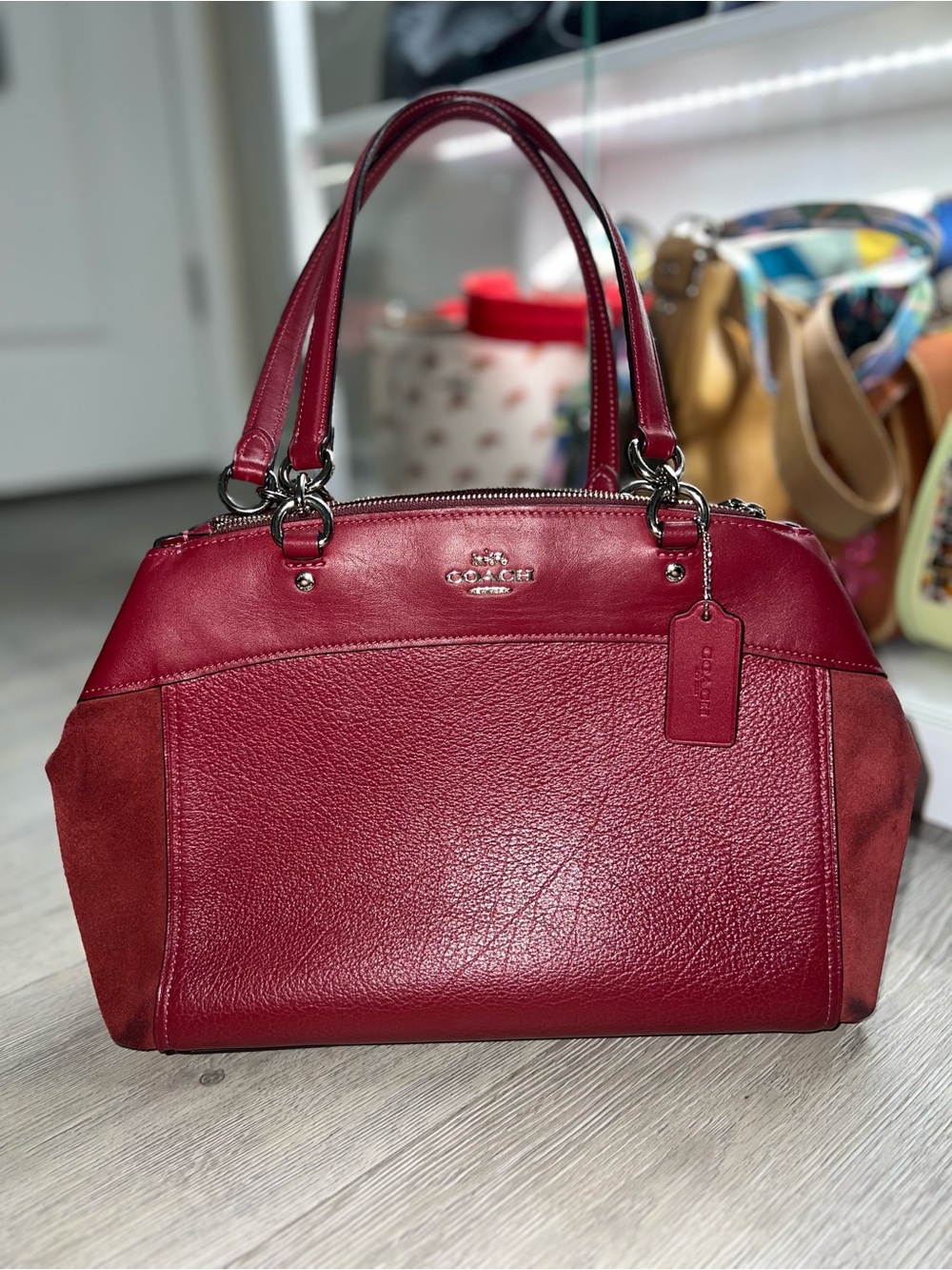 Coach Pebble Leather & Suede Satchel in maroon. 
2018